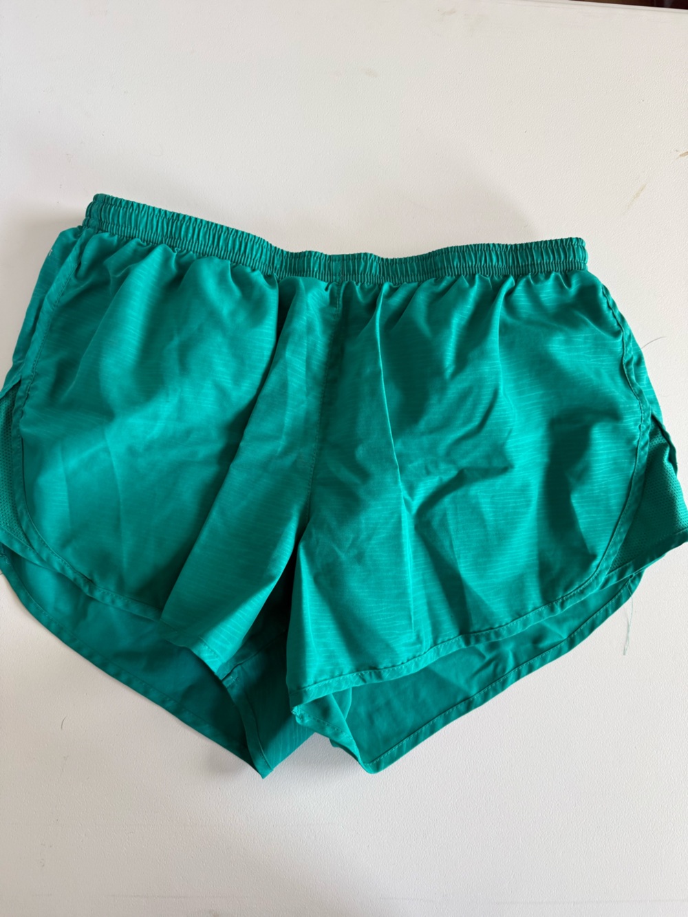 Nike Teal Women’s Athletic Shorts with pocket in back